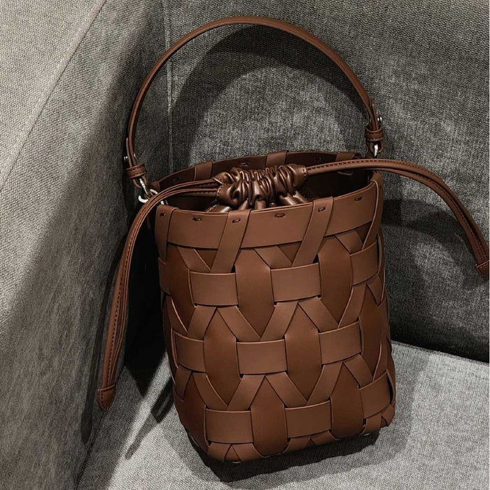 A Versatile And Casual Hand-held Crossbody Bag